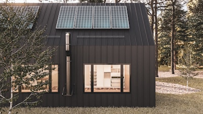 a wood building with a glass roof