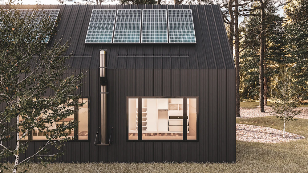 Modern tiny home exterior with large glass windows and wood construction