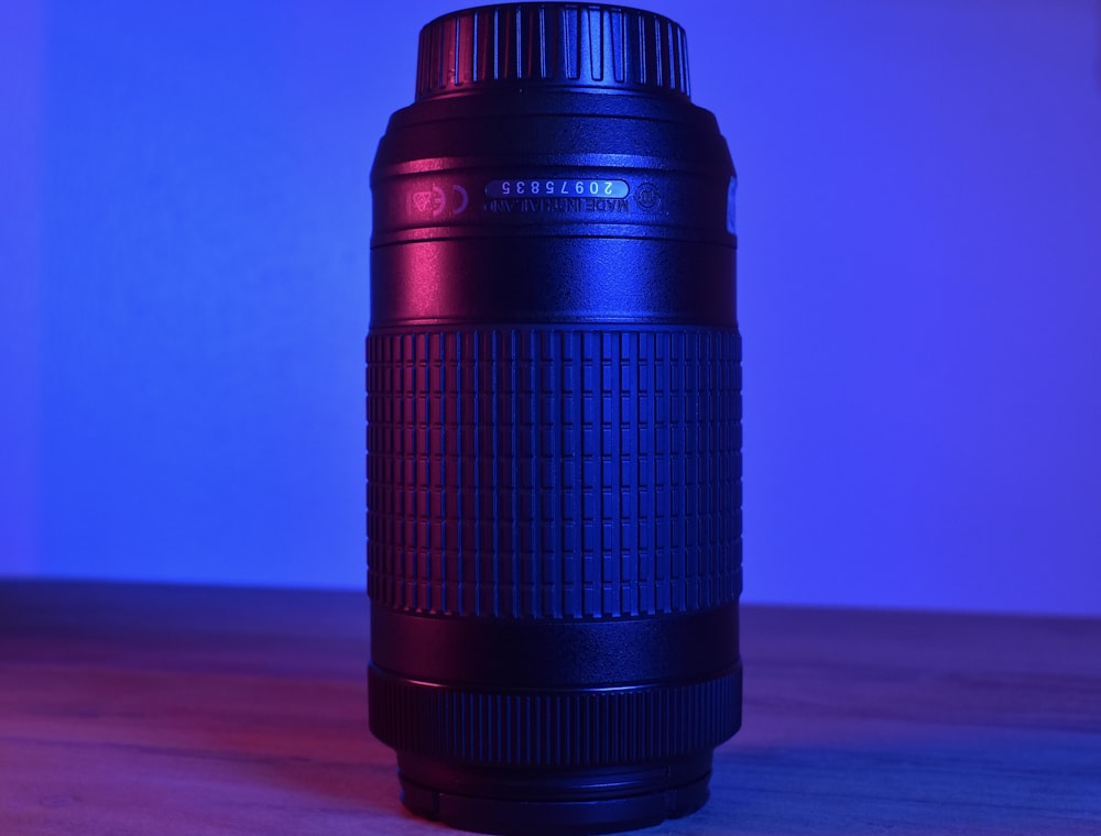 a black and red cylindrical object