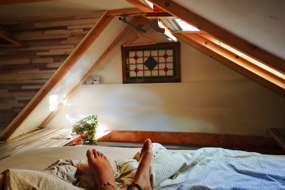 a person lying on a bed