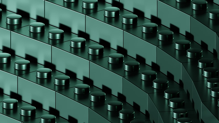 Close-up of colorful STEM building blocks assembled into a complex robotics model.