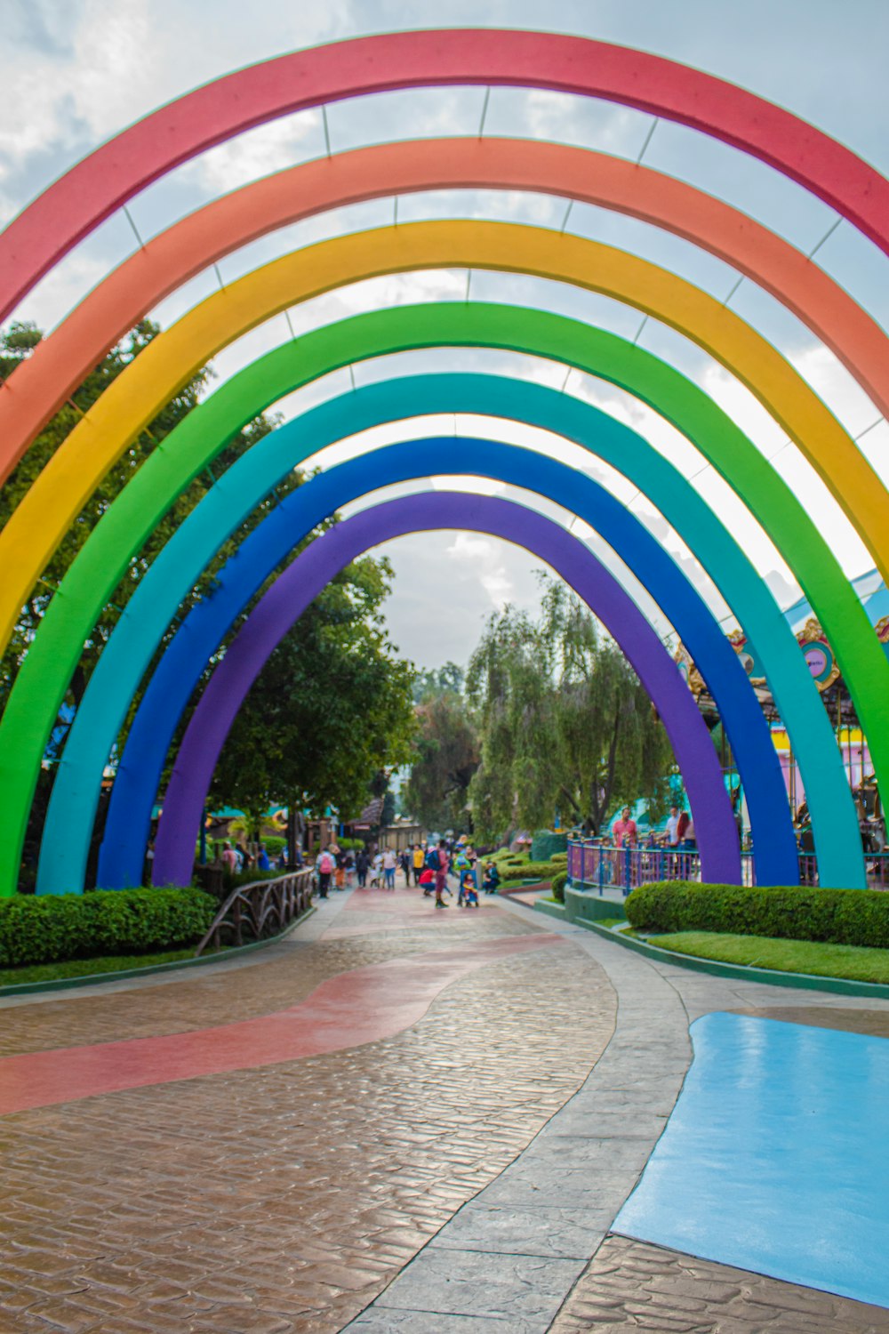 a circular structure with people walking around