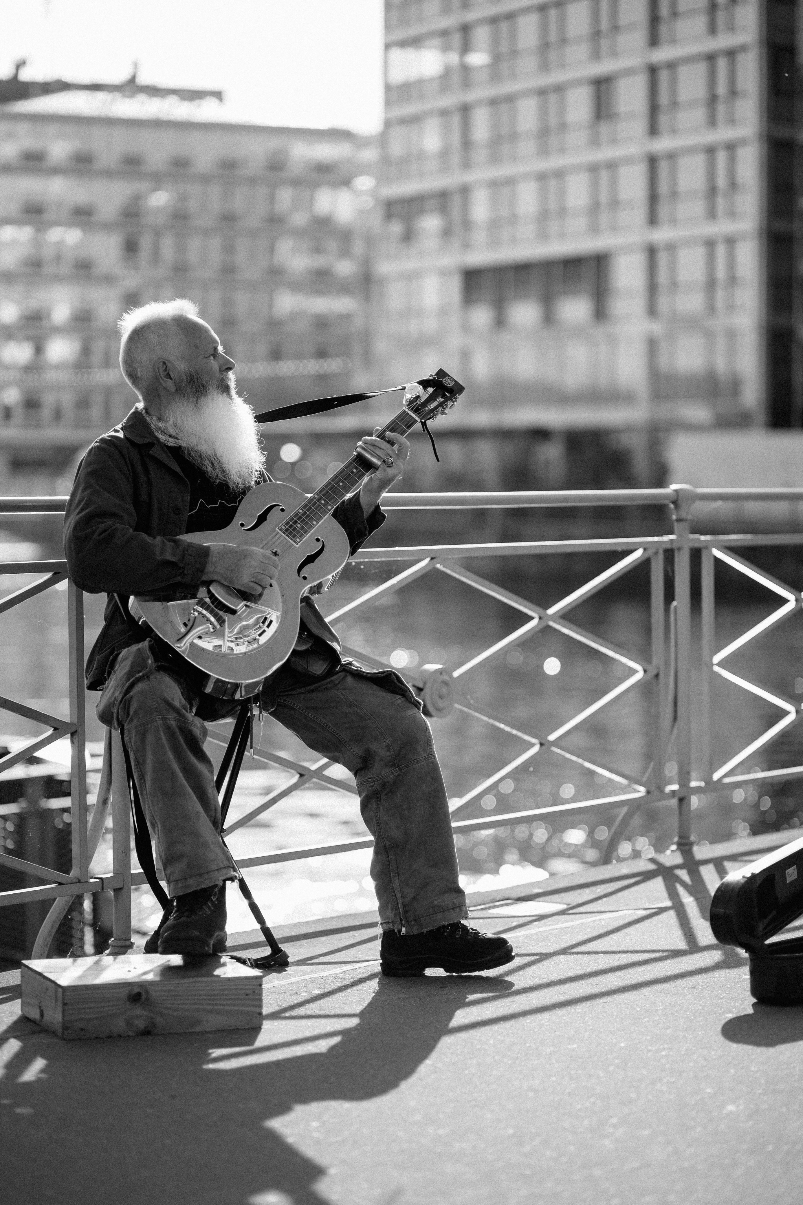 a person playing a guitar