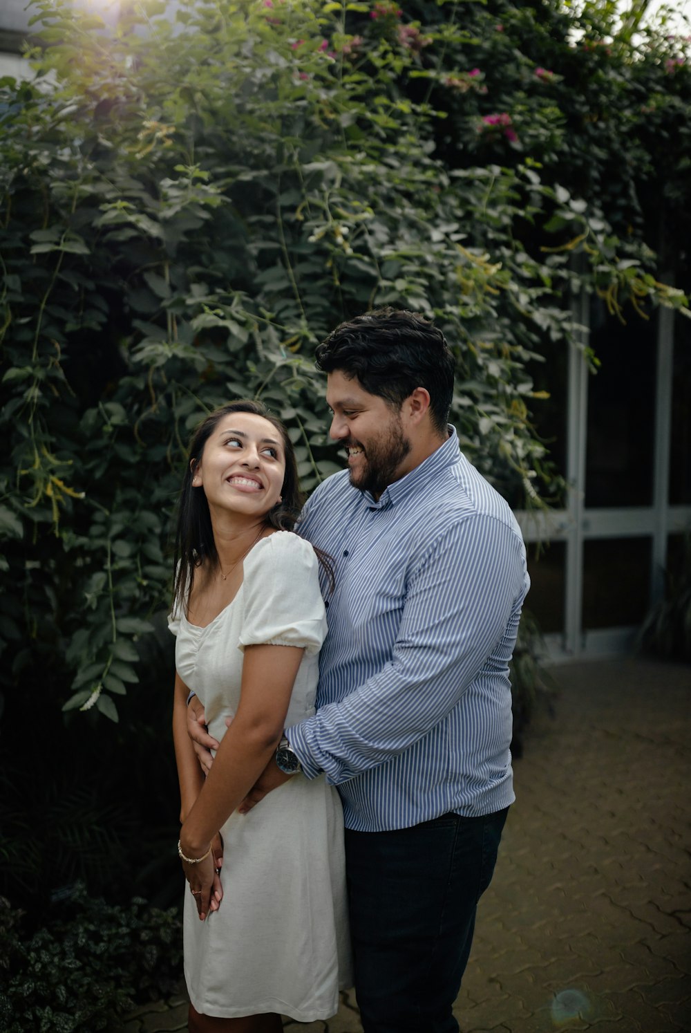 a man and woman posing for a picture