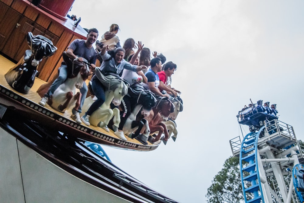 a group of people riding horses