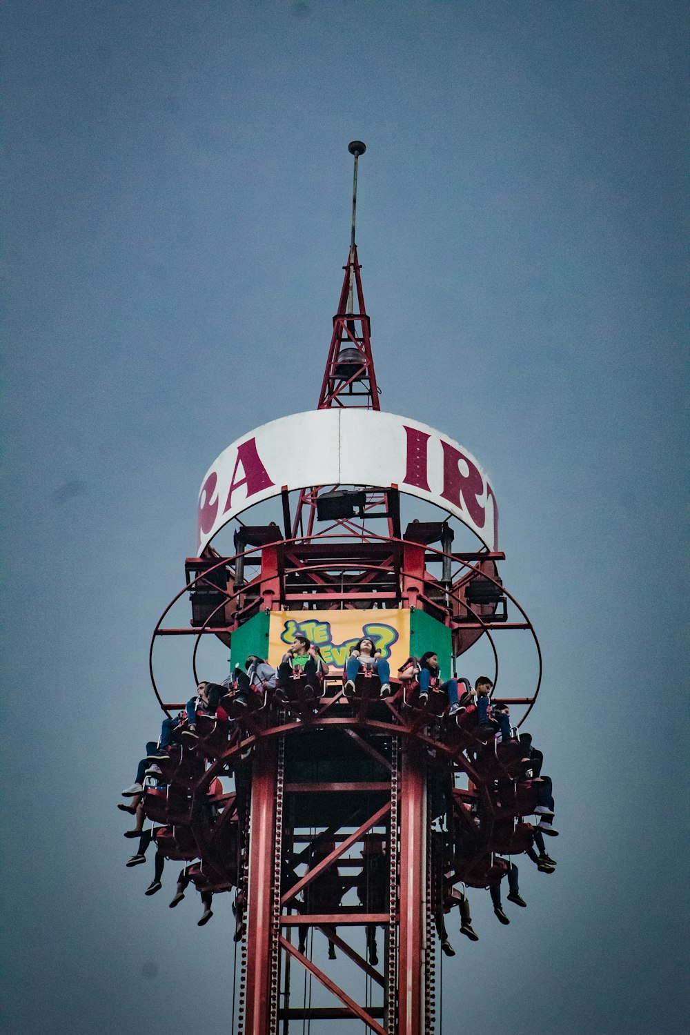 a group of people on a tower