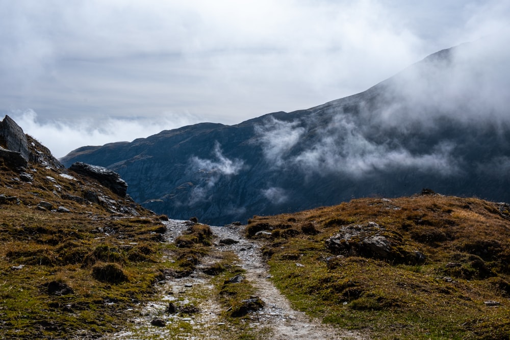 a mountain with clouds