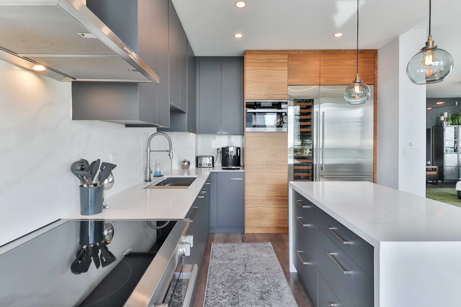 Custom kitchen cabinetry with a bar and island