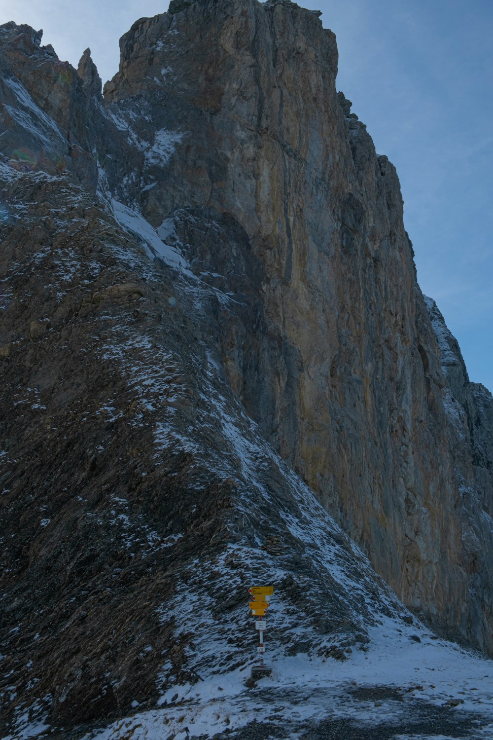 a sign on a mountain