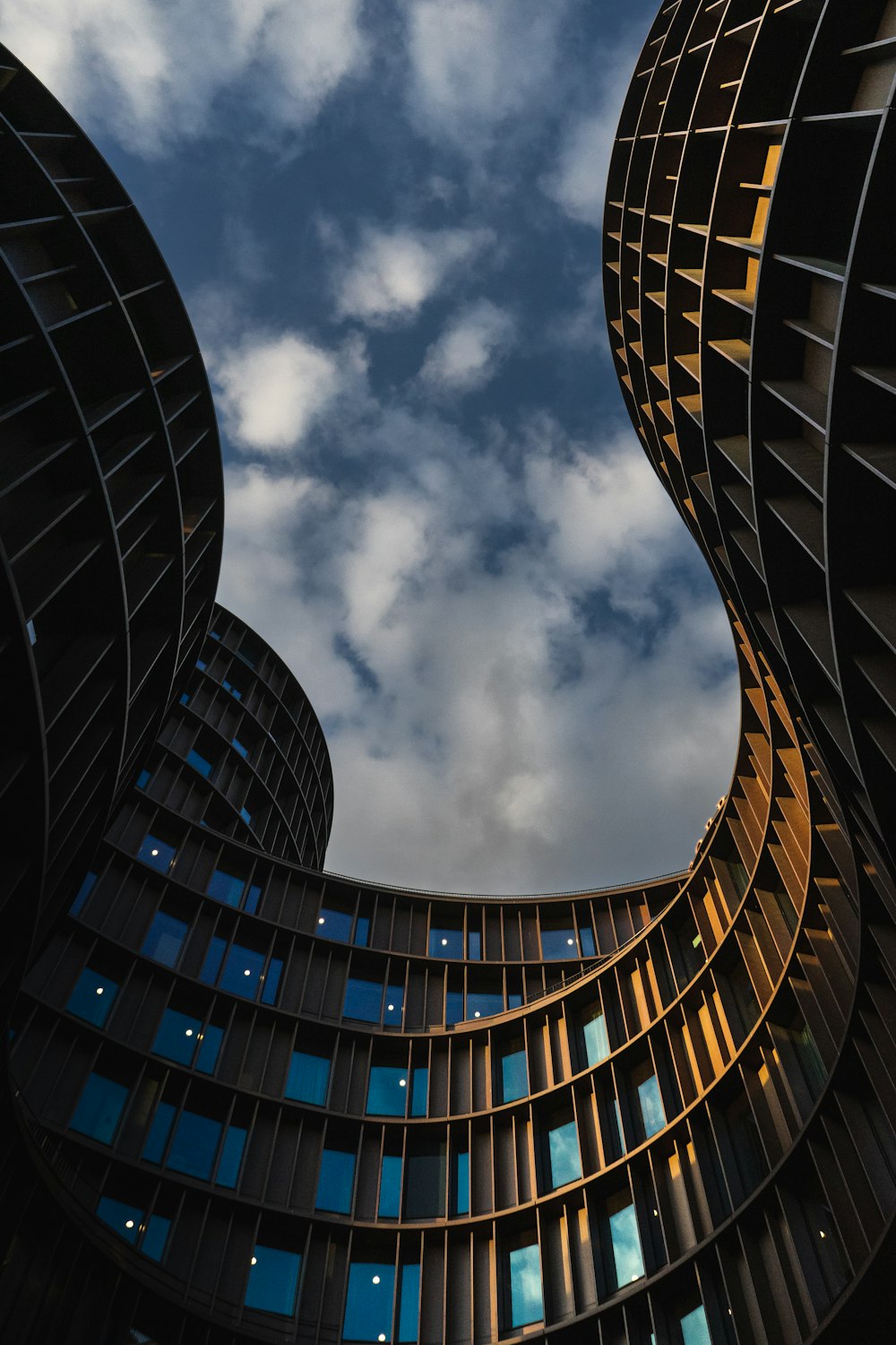 looking up at tall buildings