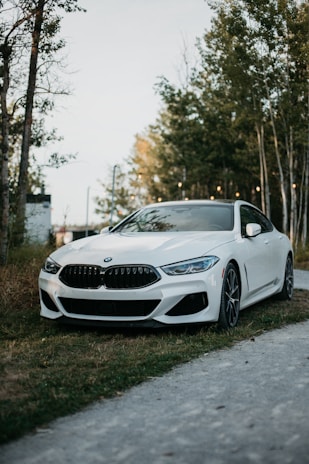 a white car parked on a road
