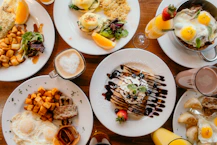 a table full of plates of food