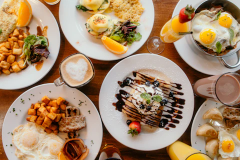 a table full of plates of food