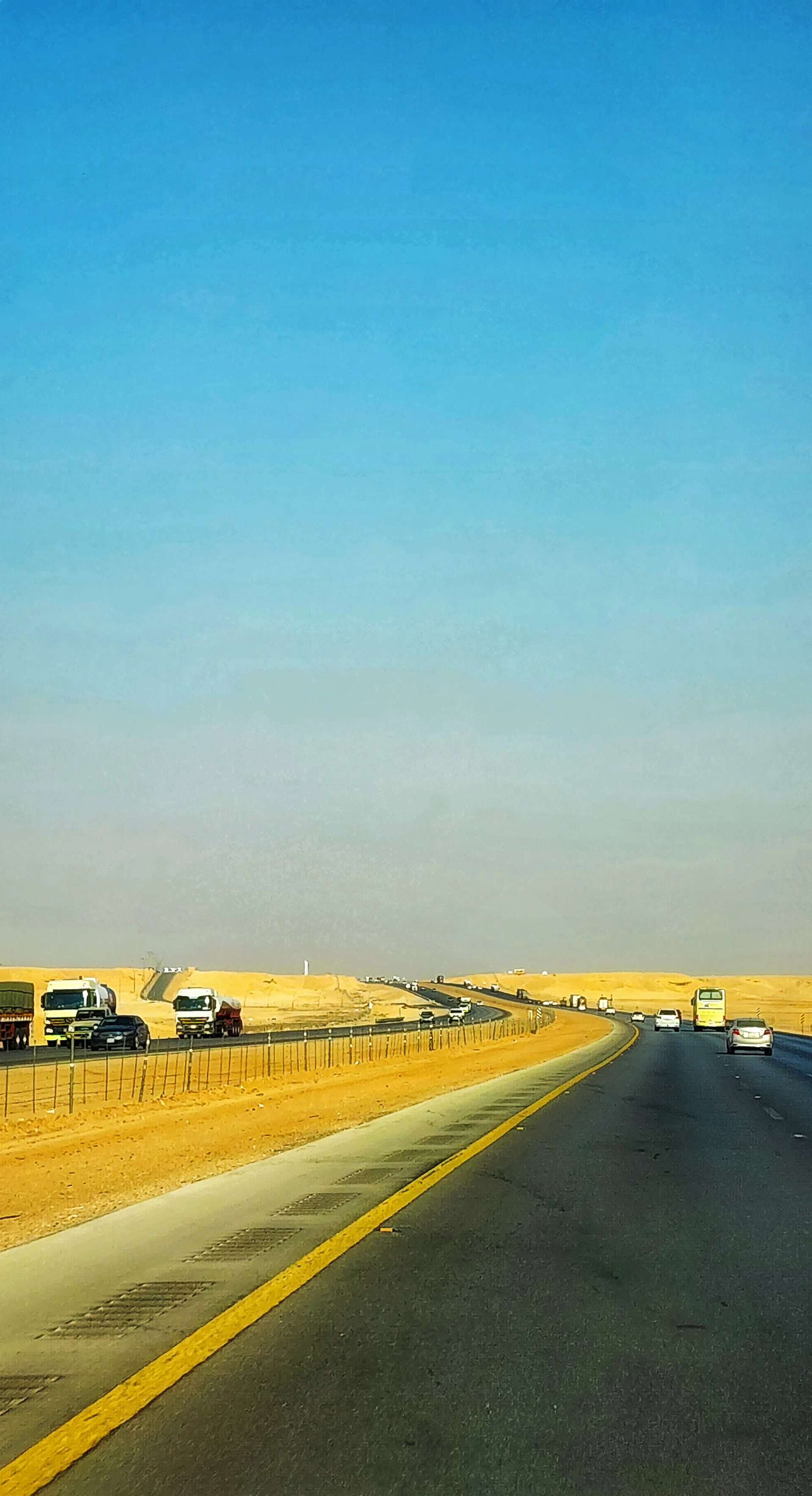 black and brown leather padded tub sofa