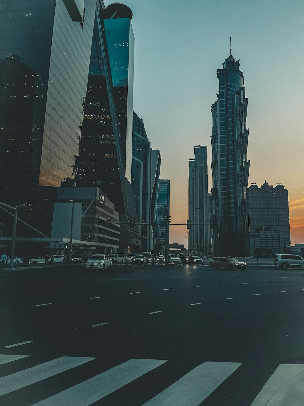 a city street with tall buildings