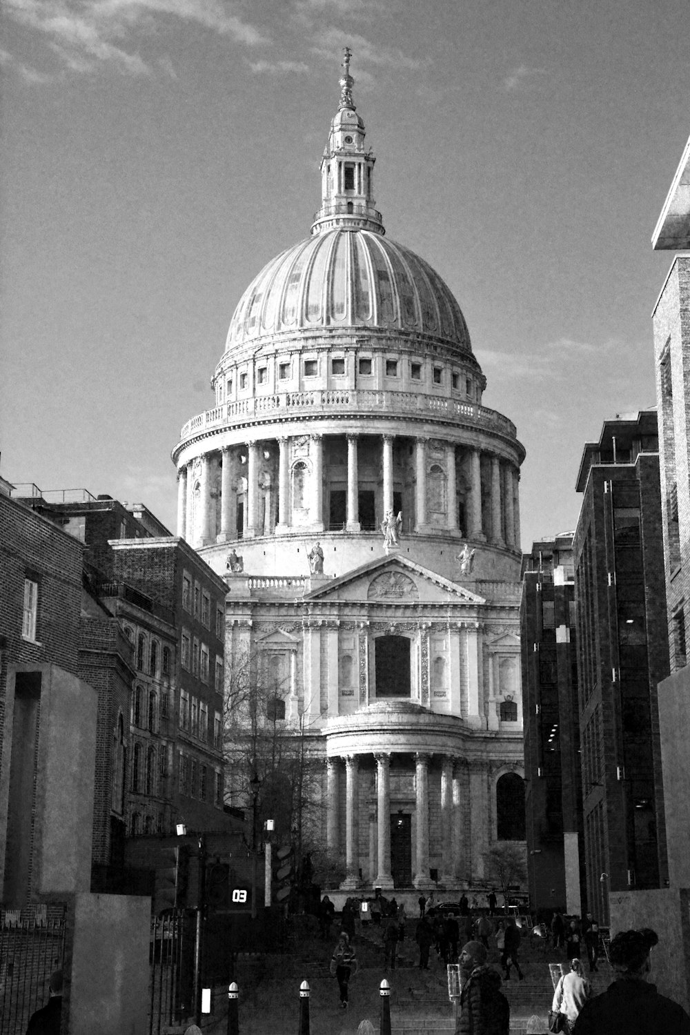 a large building with a dome with St Paul's Cathedral in the background