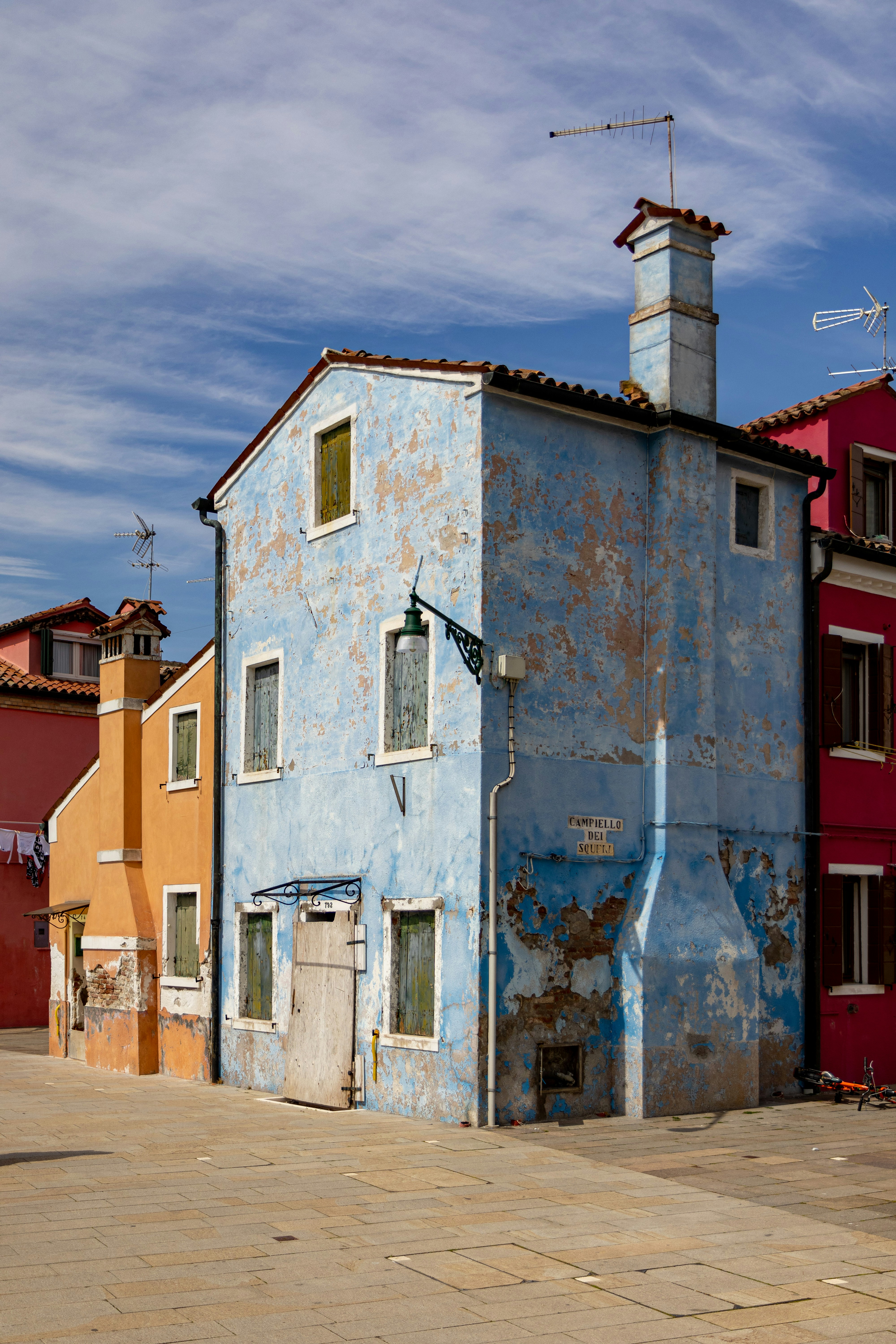 a building with a blue and white exterior