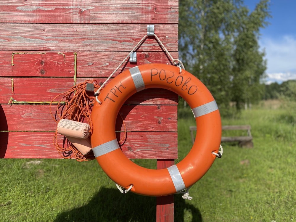 a life preserver on a red post