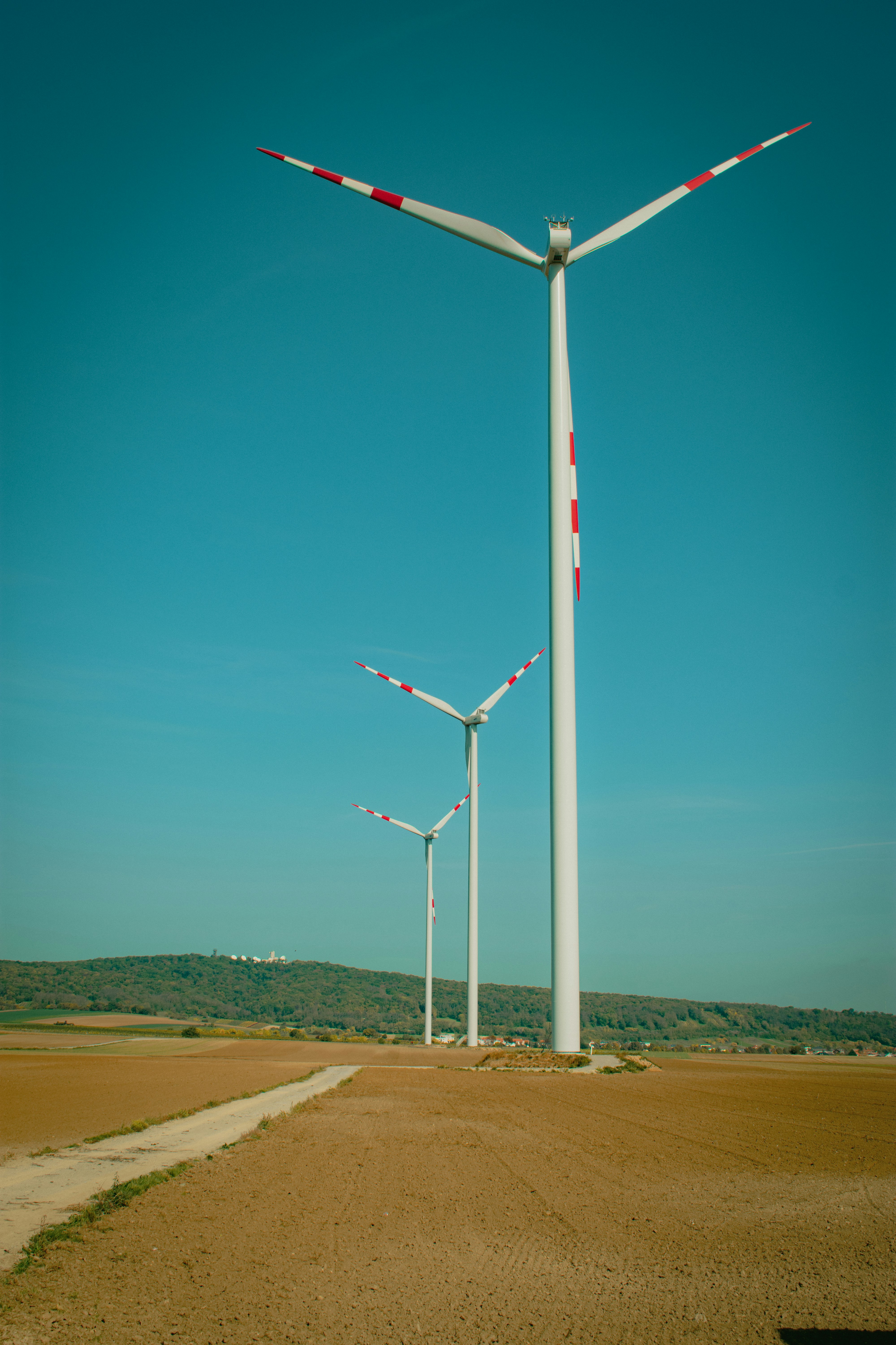 a group of wind turbines