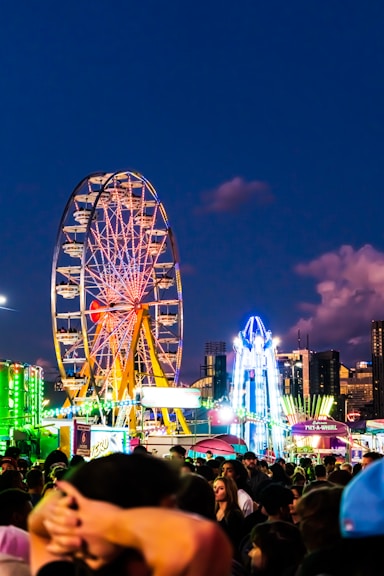 a crowd of people at a fair