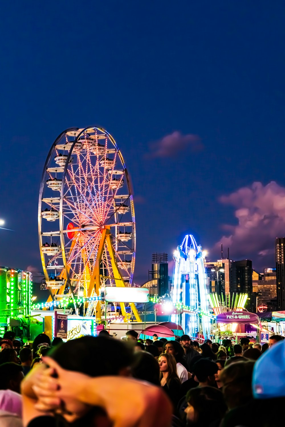 a crowd of people at a fair