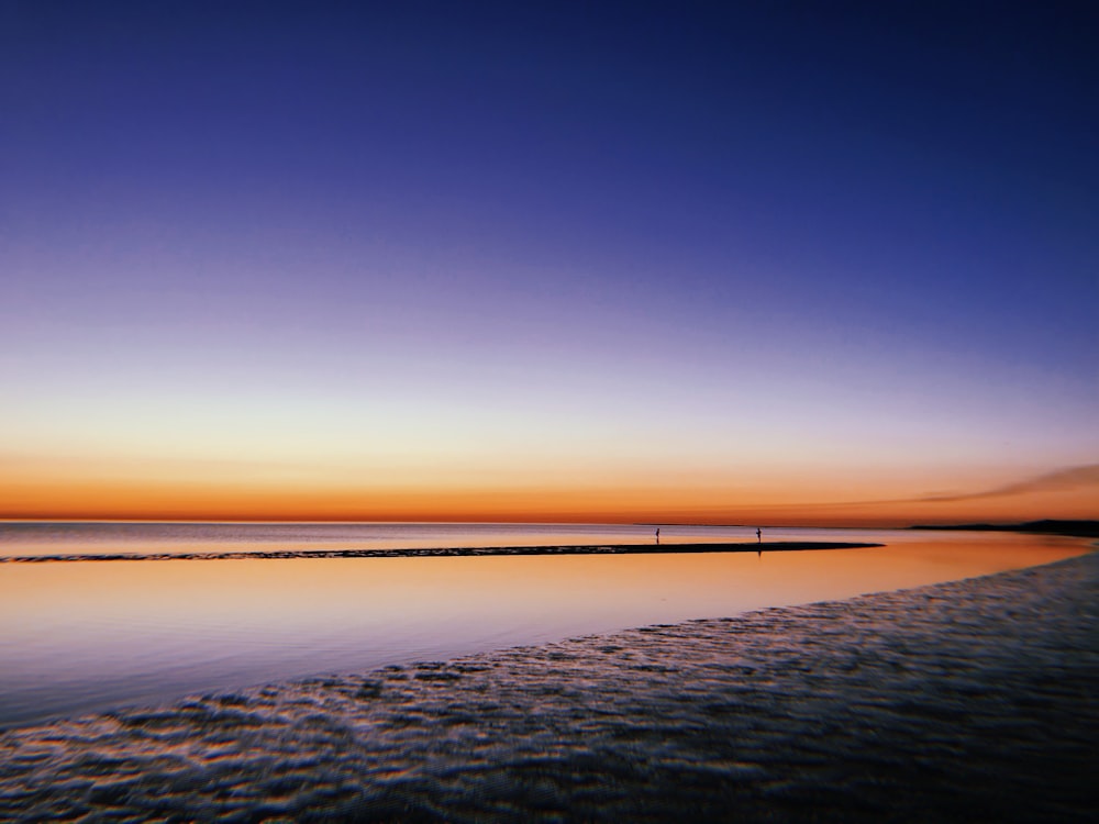 a beach at sunset