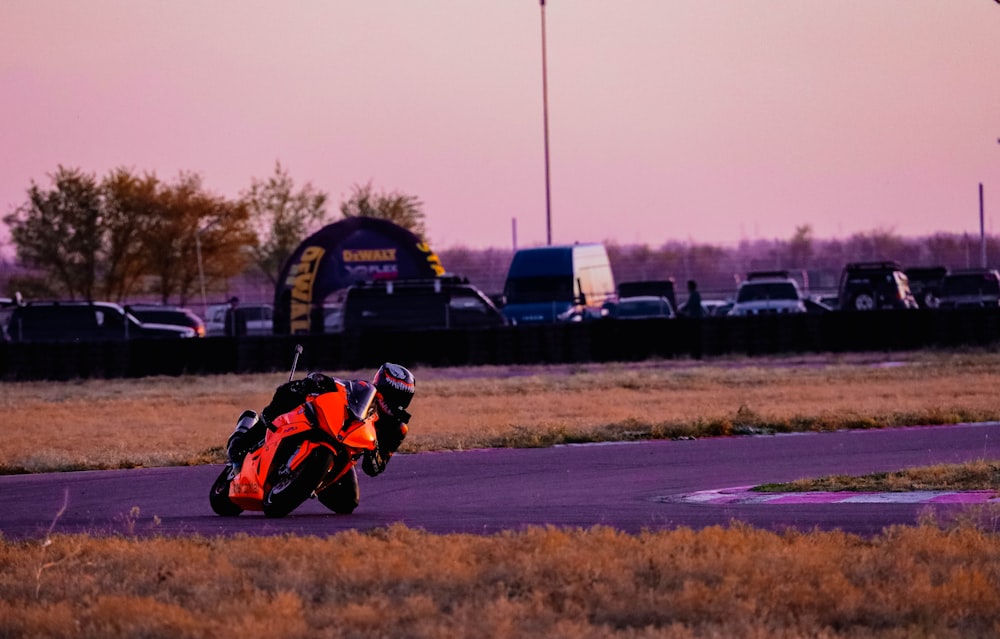 a person on a motorcycle on a track