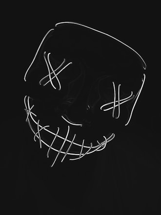 A glowing neon blue and purple human face icon smiling warmly against a dark futuristic background.