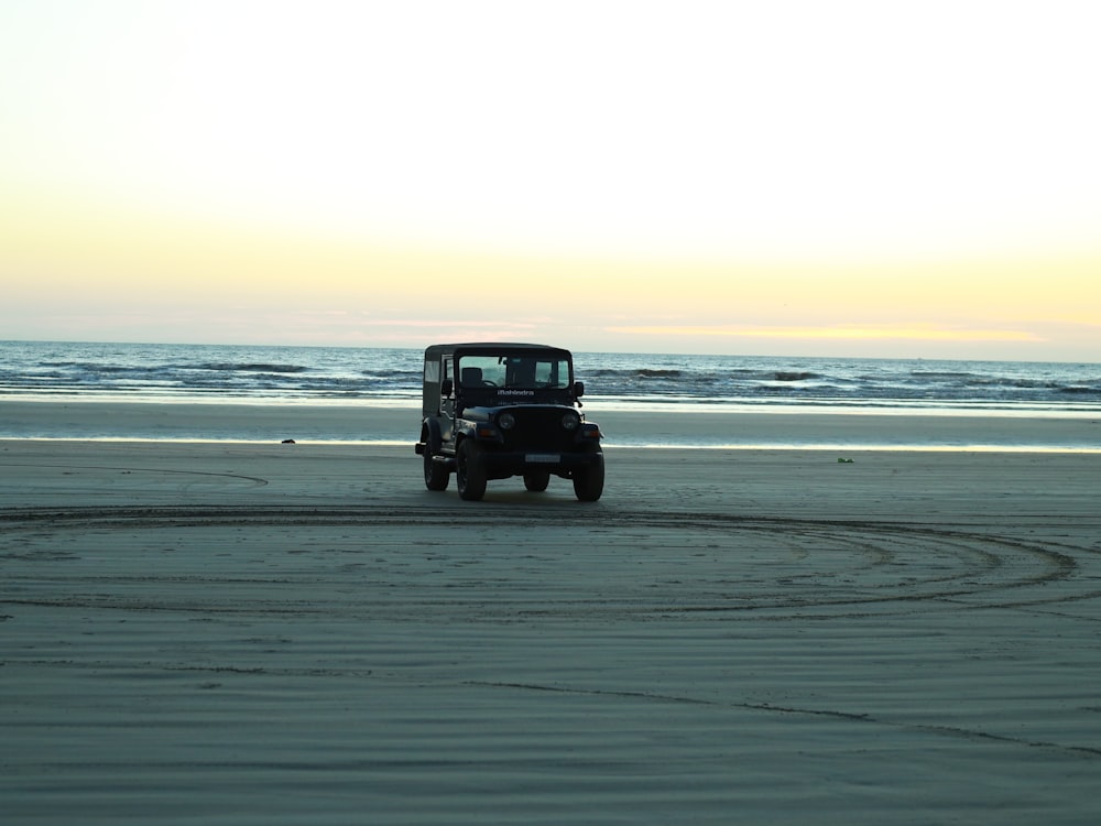 a jeep on a beach