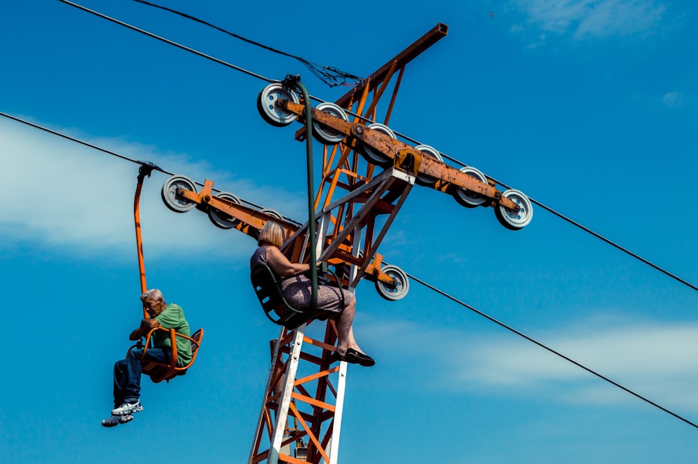 a few men on a cable