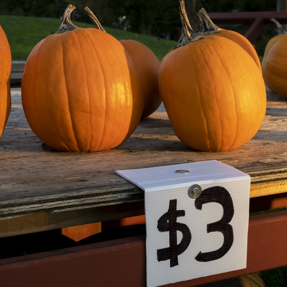 a group of pumpkins on a table