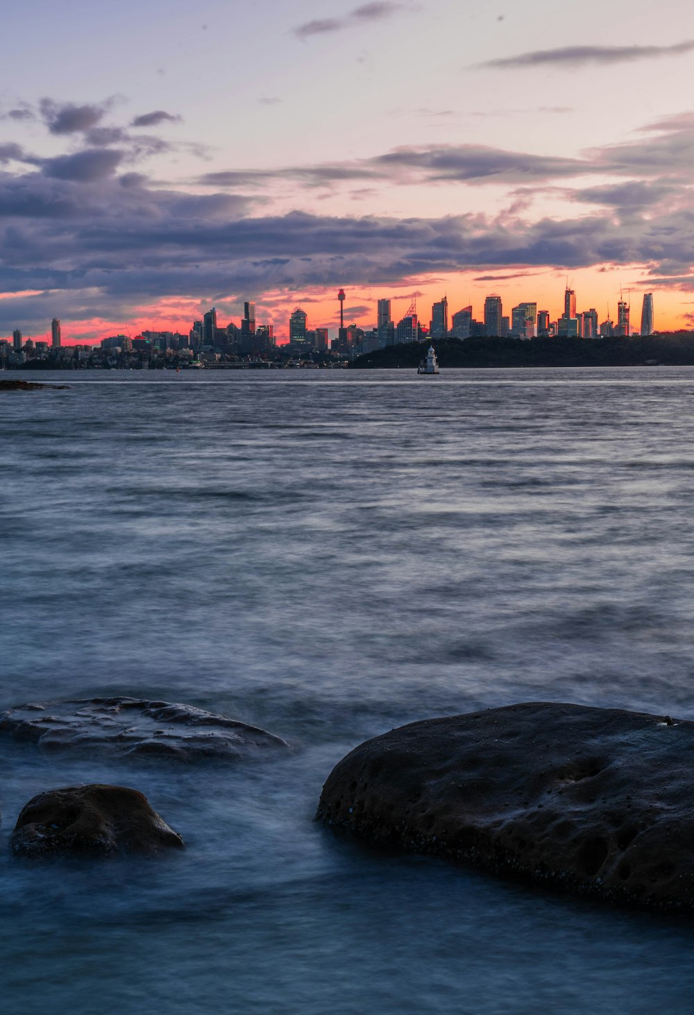 a city skyline across the water