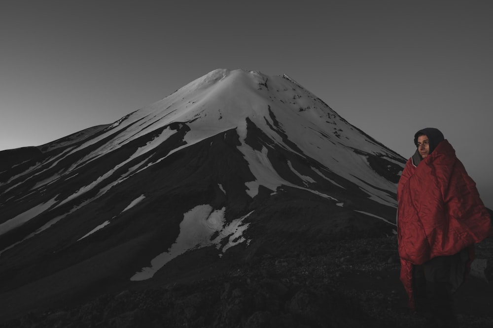 a person standing on a snowy mountain