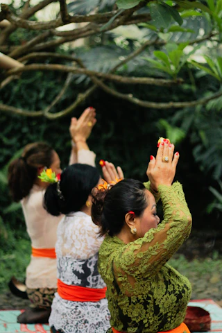 a group of women holding flowers