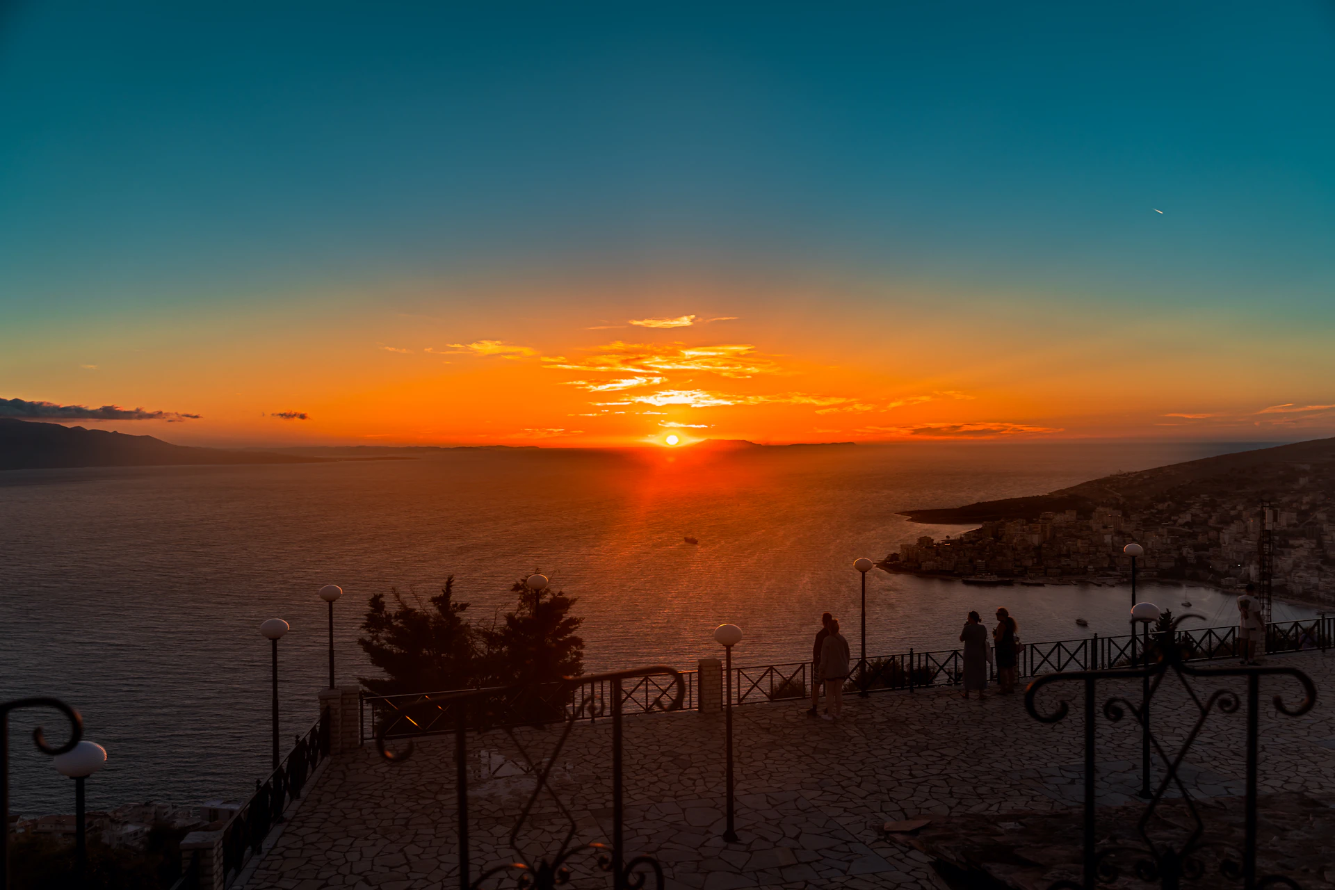 The coastline of Sarandë, Albania, seen from above at sunset