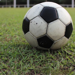 a football ball on the grass