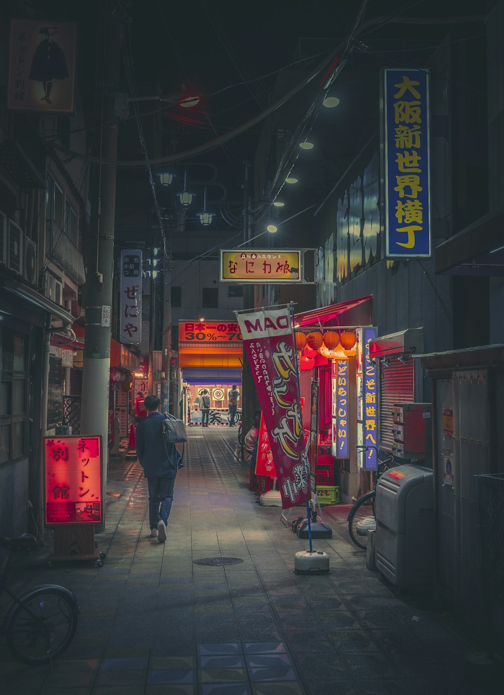 a person walking down a sidewalk