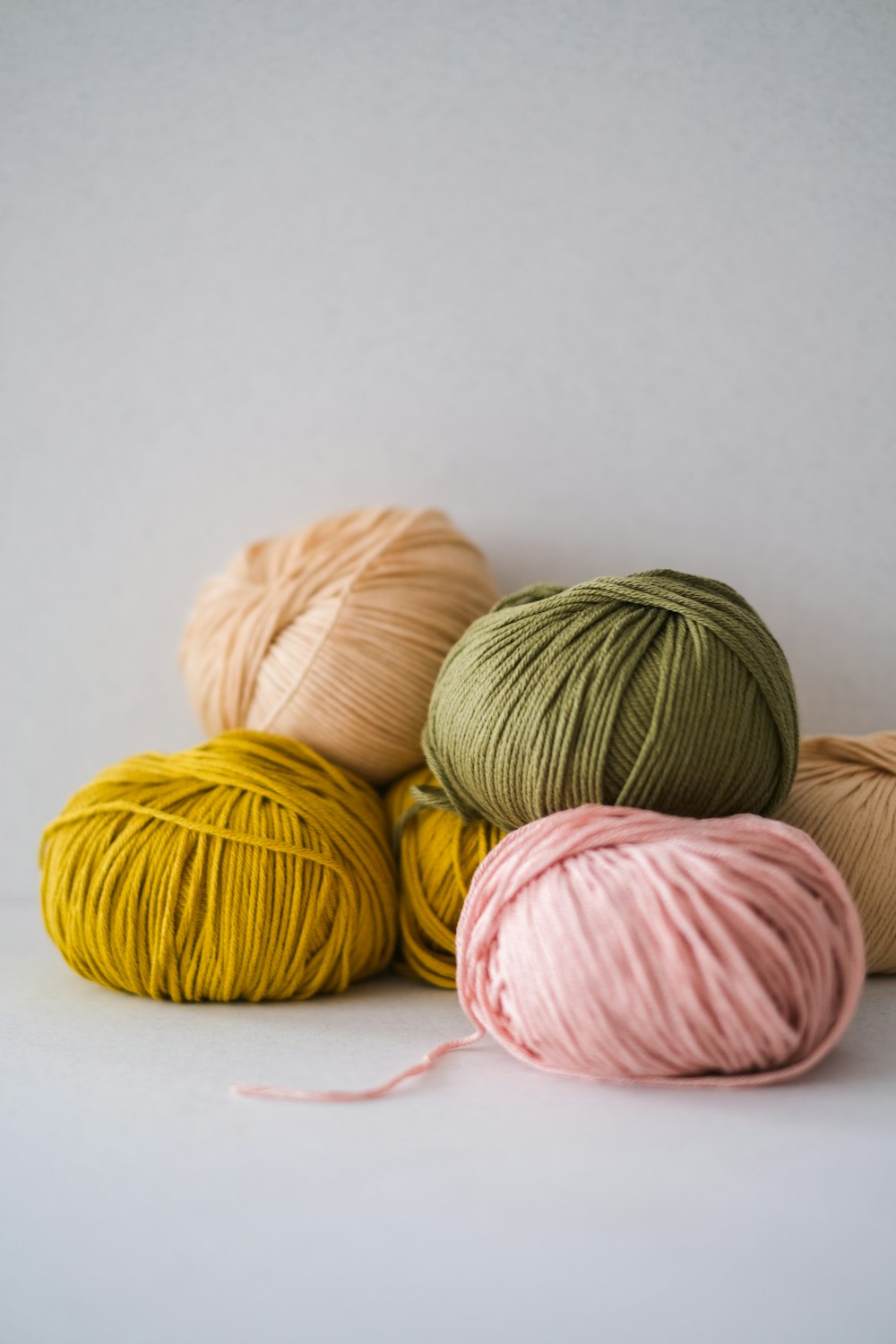 a group of colorful yarn