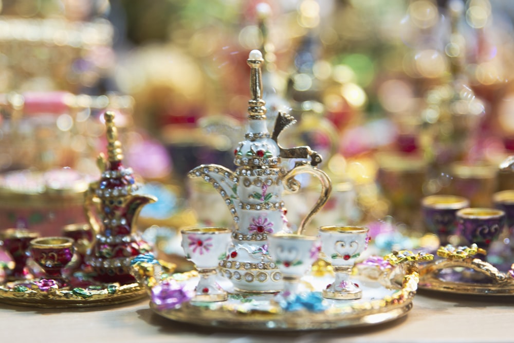 a display of teapots and teacups