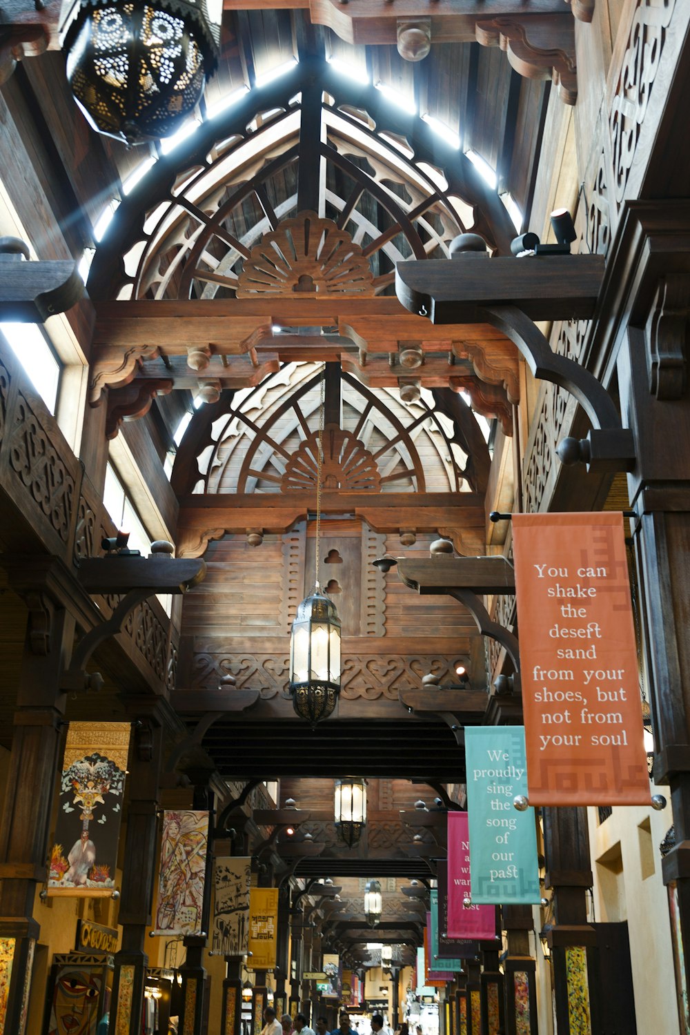 a large ornate ceiling with signs