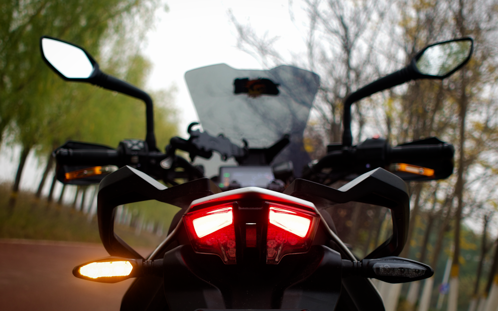 a motorcycle parked on the side of the road