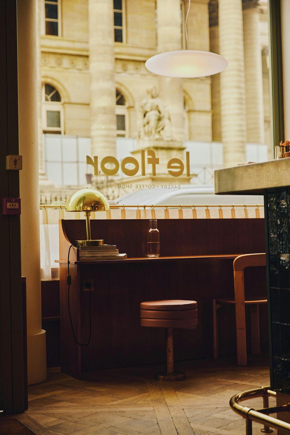 a bar with a large glass window