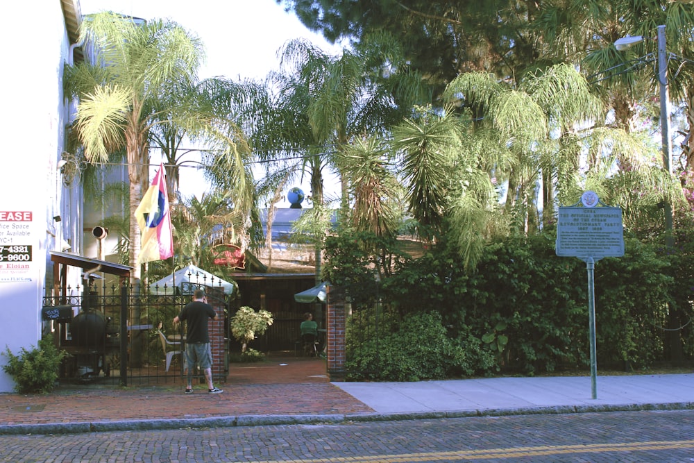 a person walking on a sidewalk