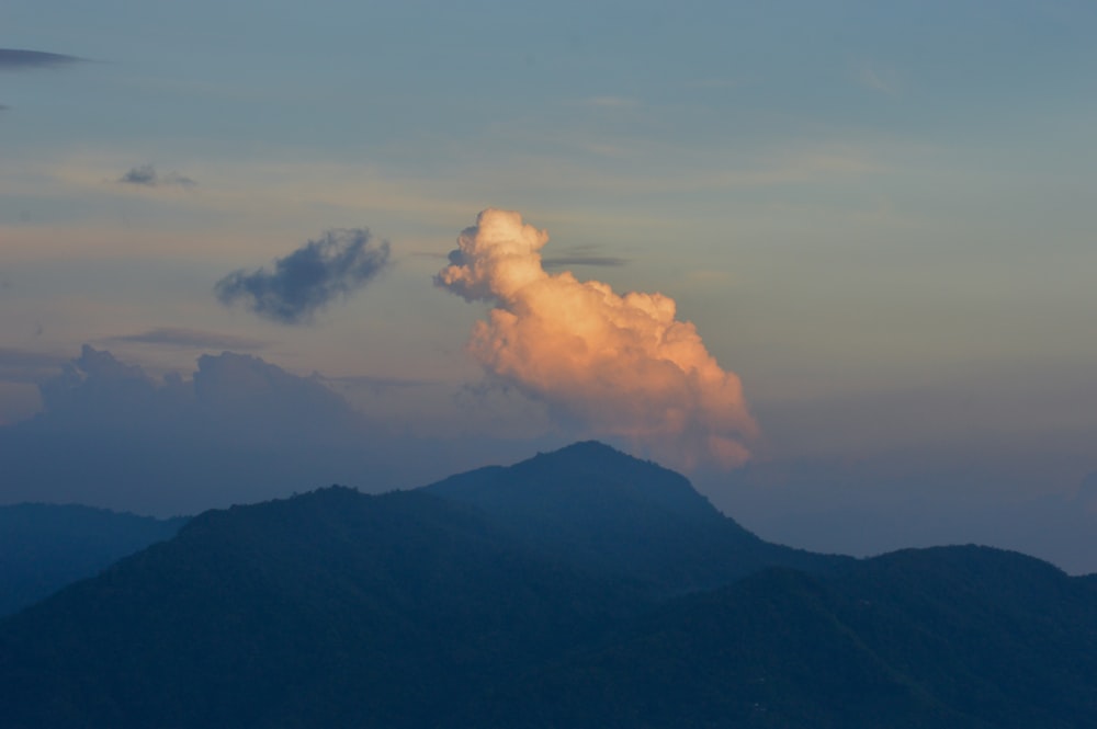 a mountain with smoke coming out of it