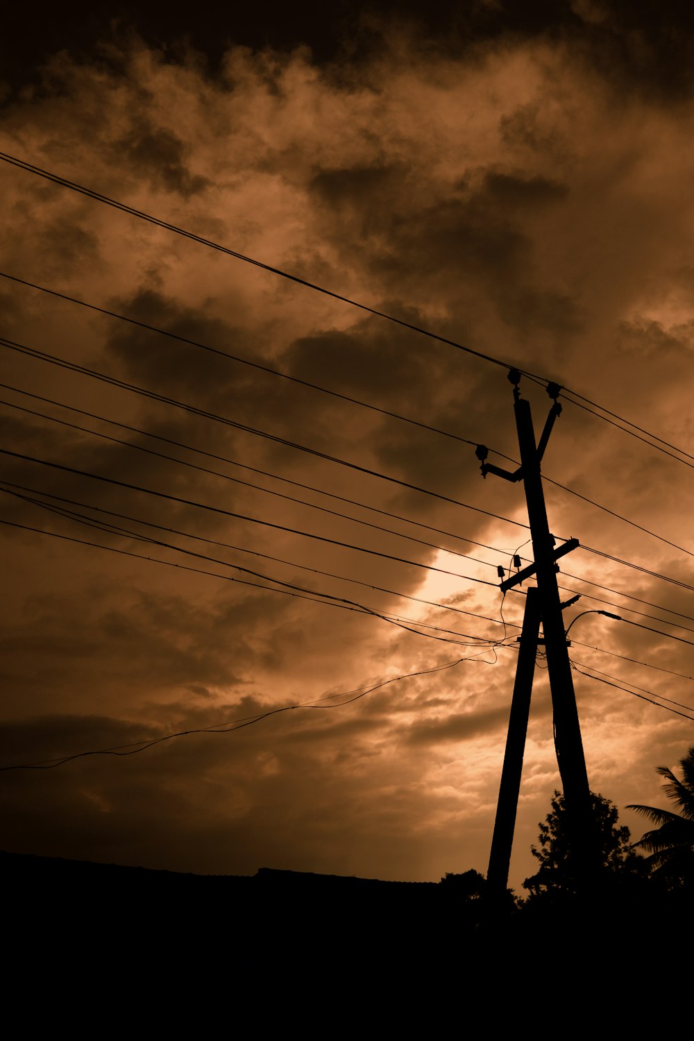 a telephone pole with wires