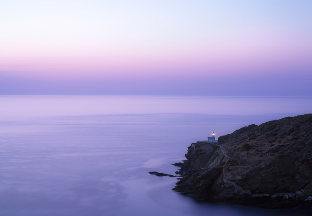 a lighthouse on a cliff