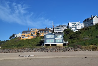 Colorful beachfront houses under a clear blue sky