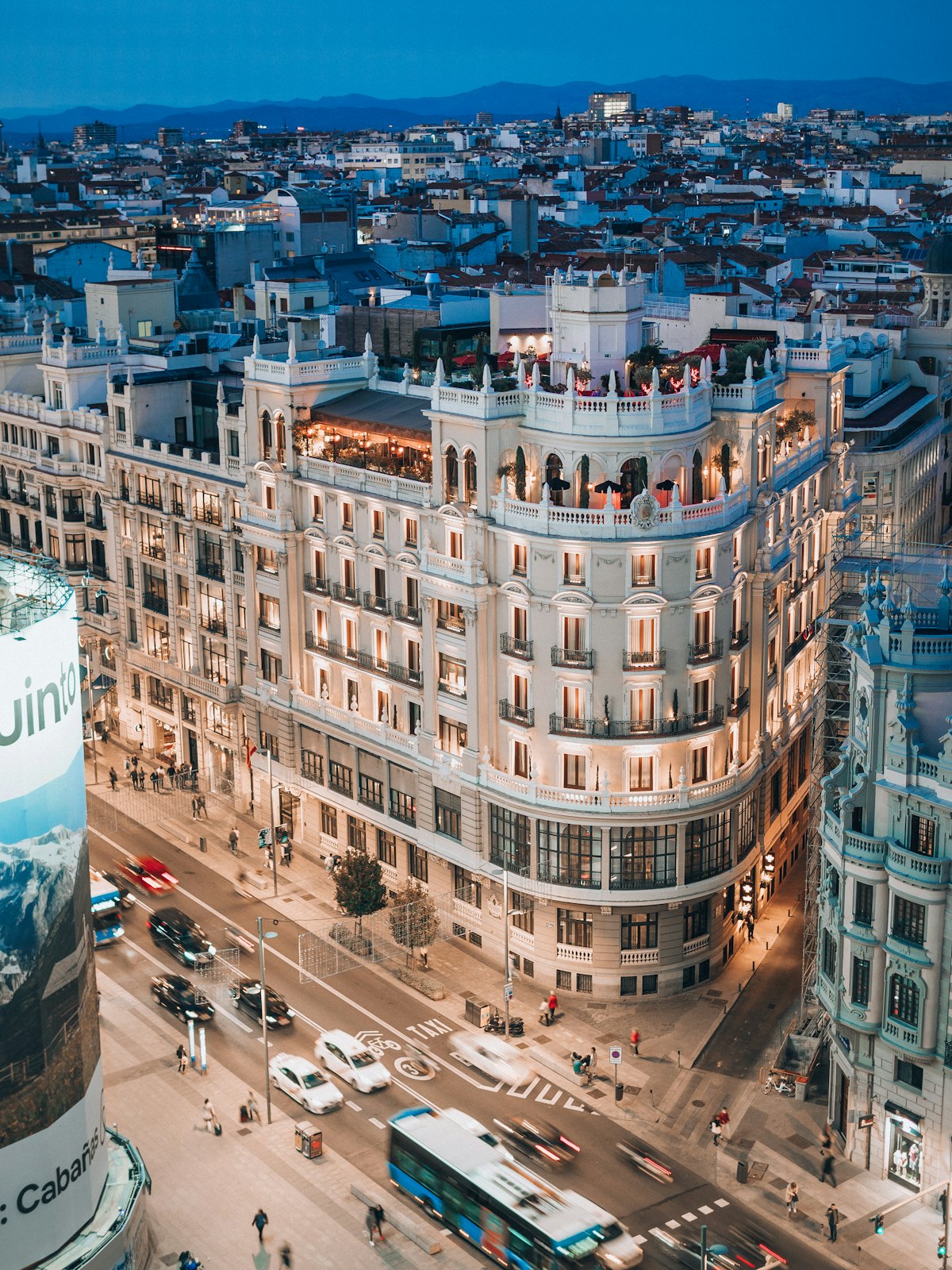 Centro / Sol Madrid — Gran Vía illuminated at night with city lights