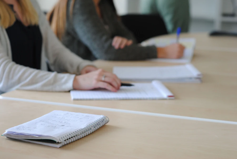 Team reviewing a project schedule and task board during a planning session
