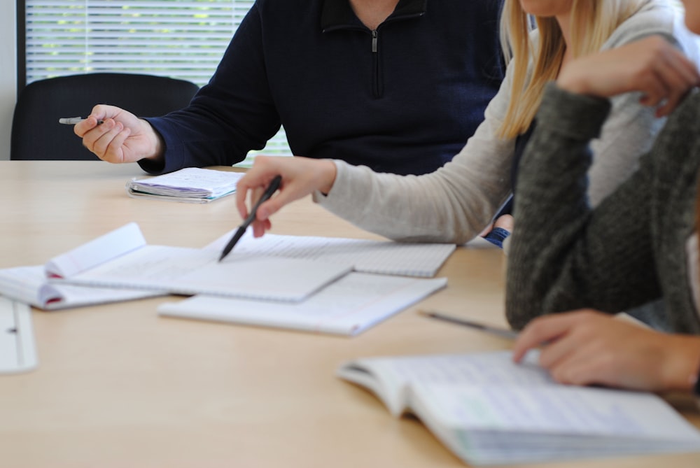 a few people working at a table